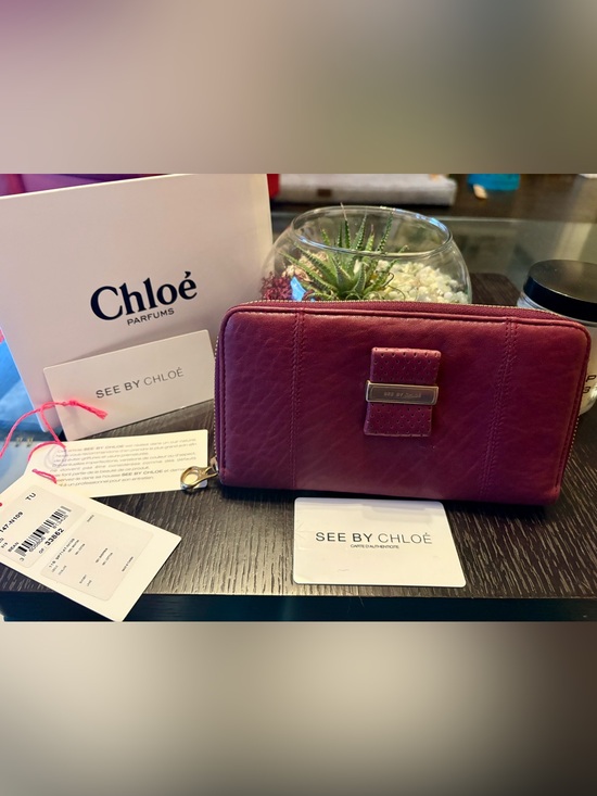 See By Chloe Handbags - See By Chloe NWT Plum Leather Zip-Around Wallet With Perforated Silver Bow